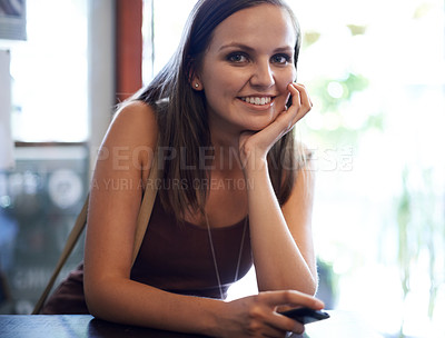 Buy stock photo Portrait, student woman and smile on campus, university and happy in school coffee shop. Female learner, gen z and young person ready for college class, lecture and with cellphone for communication