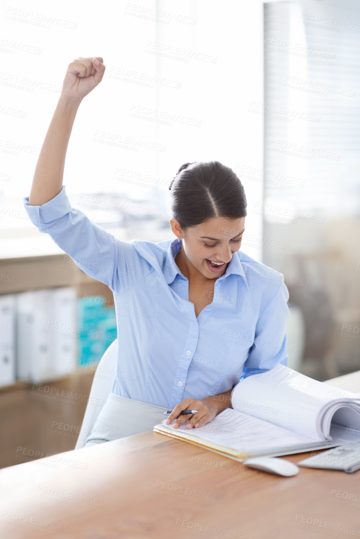Buy stock photo Excited, business woman and fist pump with documents for winning, achievement or good news at office. Happy female person or employee with smile and paperwork in satisfaction for success or promotion