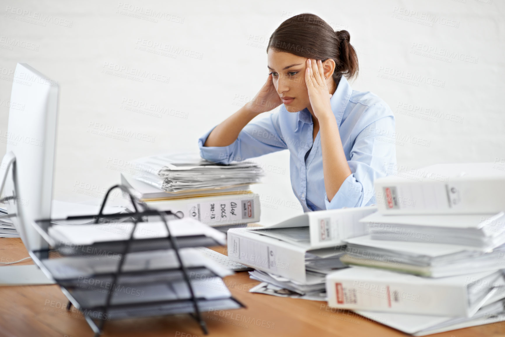 Buy stock photo Businesswoman, paperwork and workload stress from office, documents and company employee, tired and work burnout. Female secretary, frustrated and desk of business files, corporate reports and admin