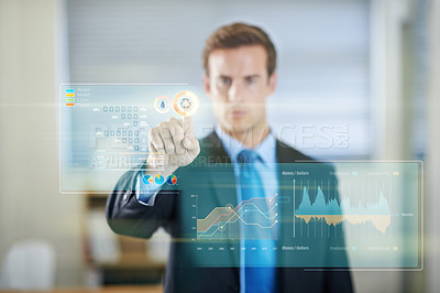 Buy stock photo Cropped shot of a handsome young businessman using a digital interface