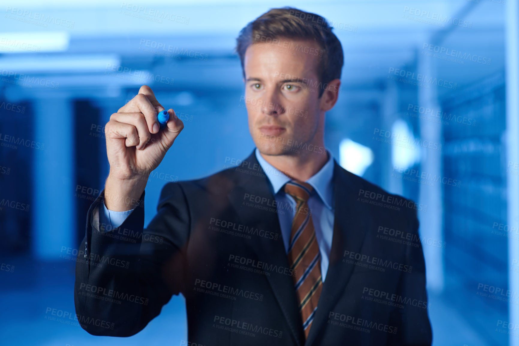 Buy stock photo Businessman, planning and writing on touchscreen with marker in office for ideas, strategy or future. Professional, brainstorming or manager problem solving on glass or screen in workplace at night