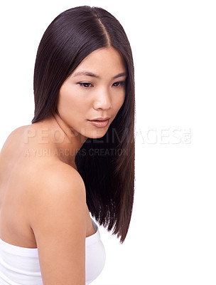 Buy stock photo Woman, hair treatment and cosmetics for beauty in studio, growth and pride for keratin on mockup space. Asian female person, shampoo and conditioner for health, white background and dermatology