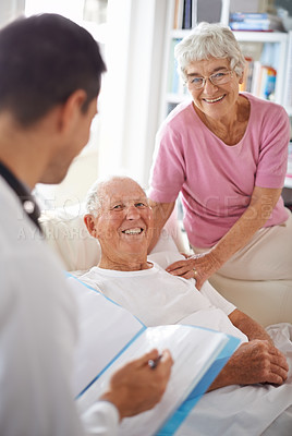 Buy stock photo Doctor, senior patient and paperwork in nursing home for wellness, diagnosis and healthcare. Consultation, medical professional and elderly couple for rehabilitation, discussion and positive report