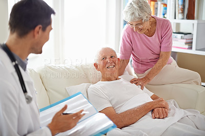 Buy stock photo Healthcare, doctor and patient in nursing home for health results, rehabilitation or wellness. Medical professional, consultation and elderly couple for treatment, discussion and positive news.