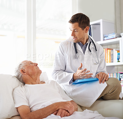 Buy stock photo Doctor, communication and elderly man on sofa with discussion, consultation or advice for treatment in hospice. Healthcare, patient and medical professional with talking for planning, help or results