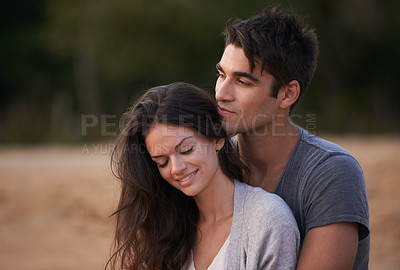 Buy stock photo Couple, relax and embrace outdoor with love in nature on holiday or vacation in summer. People, smile and calm moment together on date or travel in Florida to beach and hug partner with gratitude