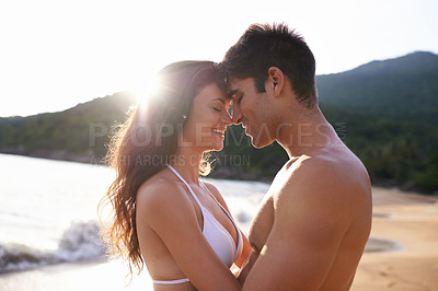 Buy stock photo Beach, date and couple with love at sunset on holiday or travel to Bali on vacation in summer. Tropical, island and man with gratitude for woman and smile with kindness, care and support together