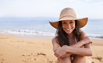 Buy stock photo Relax, portrait or happy woman at ocean on holiday vacation for travel adventure, picnic or peace in Bali. Tourist, hat or female person on sand with a smile in nature for fresh air, beach or sea