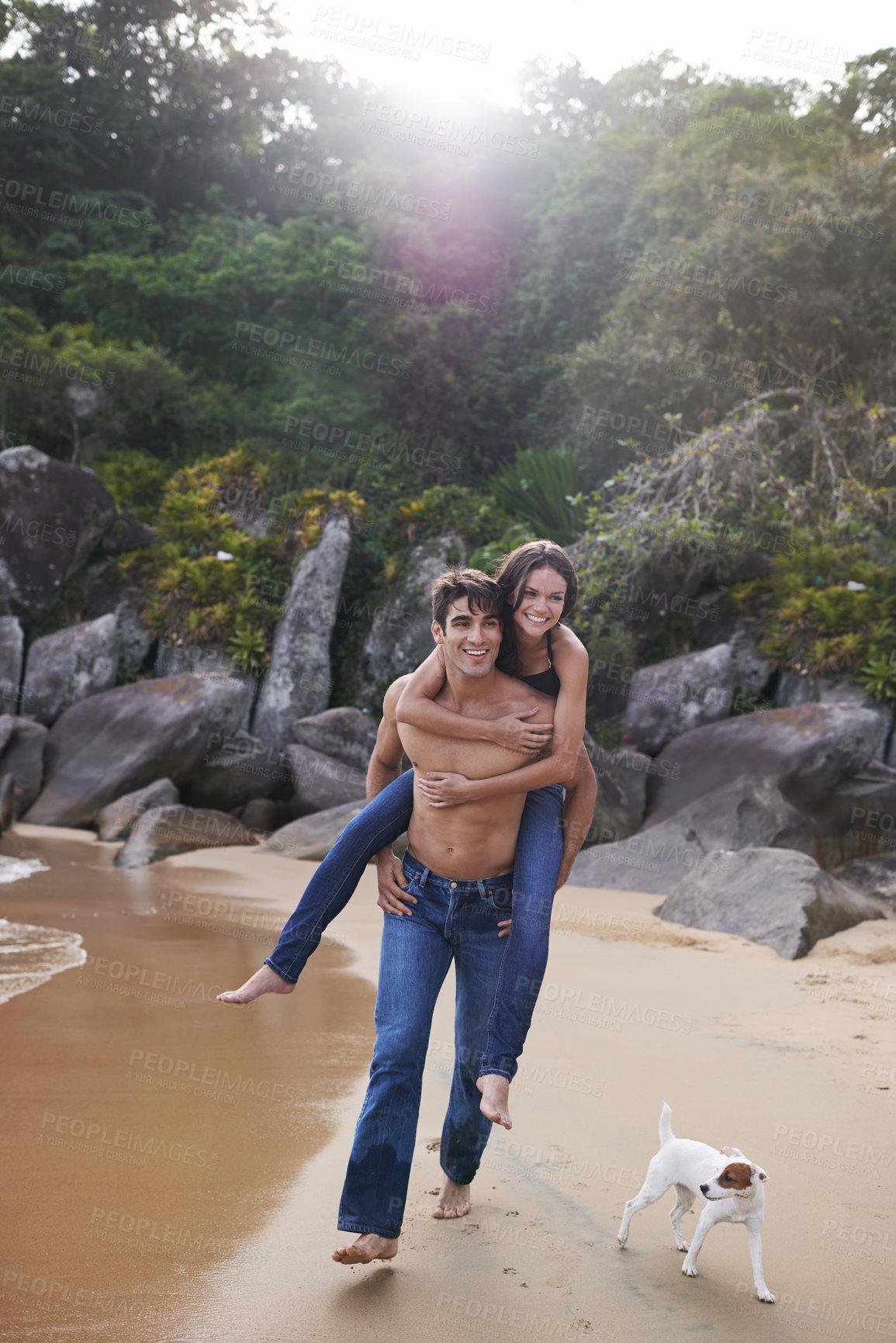 Buy stock photo Beach, piggy back and couple with dog, travel adventure and relax on summer island holiday. Ocean vacation, woman and man happy in nature on romantic date together with smile, love and puppy in Bali