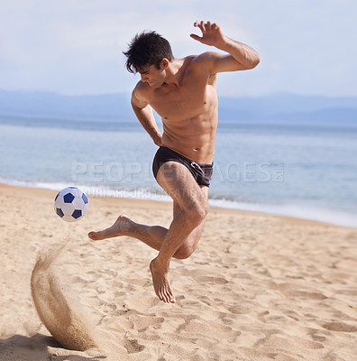 Buy stock photo Male athlete, soccer and sand on beach, exercise and training for cardio sports. Bathing suit, football and athletic man on holiday and fun on shoreline, summer and workout and outdoor on vacation