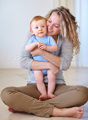 Buy stock photo Shot of an attarctive young woman and her adorable son