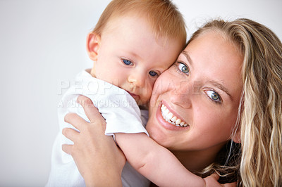 Buy stock photo Shot of an attarctive young woman and her adorable son