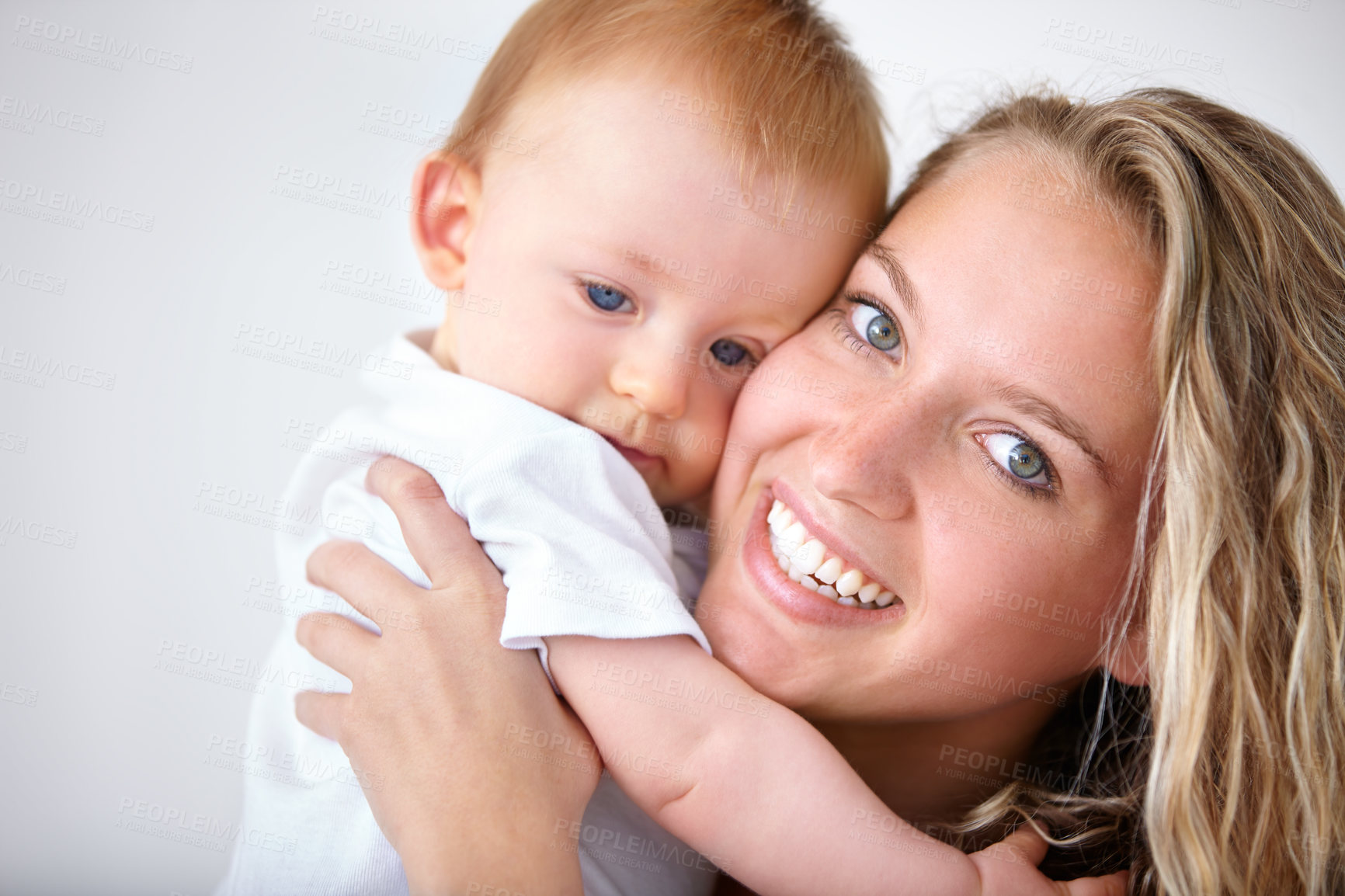 Buy stock photo Shot of an attarctive young woman and her adorable son