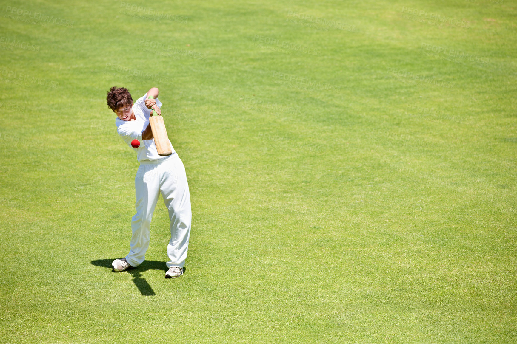 Buy stock photo Cricket, sport and batsman hitting ball on a pitch for training, game or competition. Child cricketer with bat or gear for action, playing professional sport and exercise for fitness on grass mockup