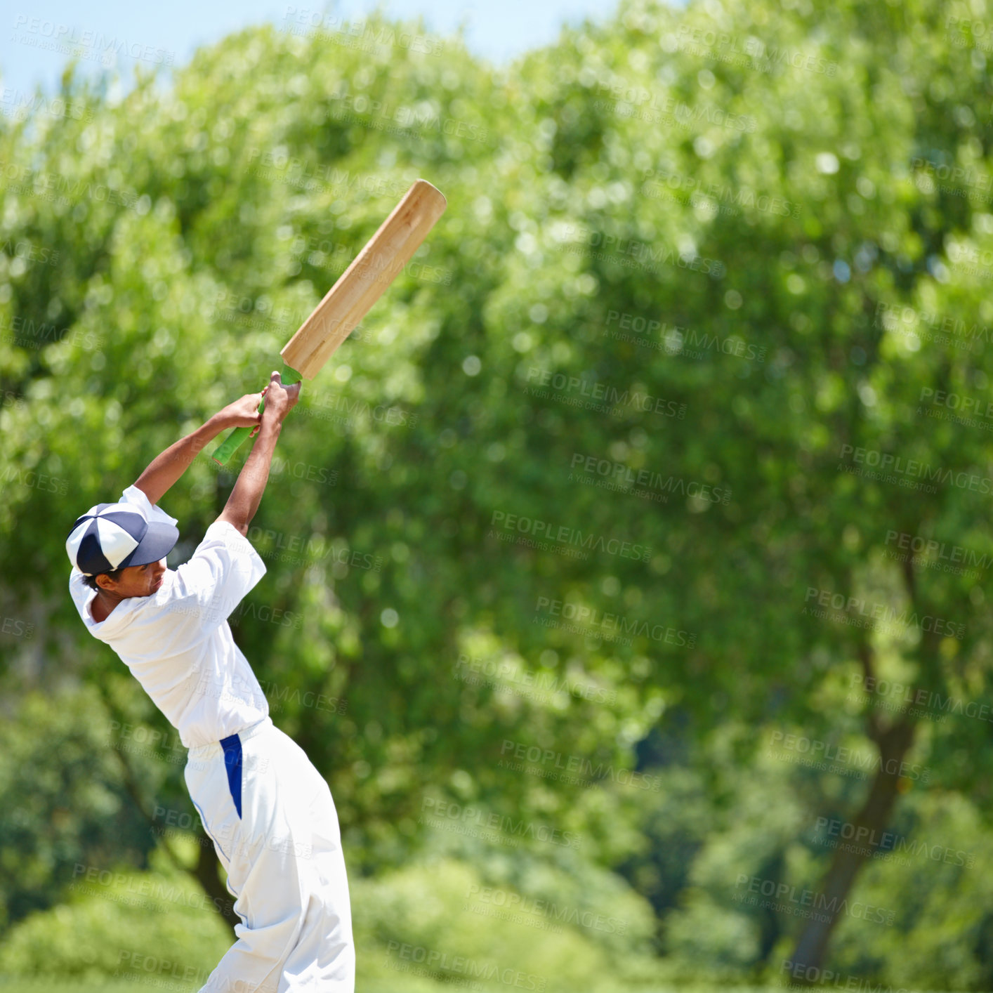 Buy stock photo Cricket player, bat and playing in competition on field, action and athlete with skill in game. Fitness, batsman and outdoor to practice for sports match in uniform and stroke or shot to score a run