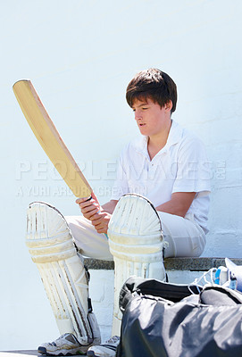 Buy stock photo Child, cricket and nervous for training, test or competition for practice or workout. Teenager, sports and gear for exercise, sport and wall with athlete waiting to bat or pitch for summer fitness