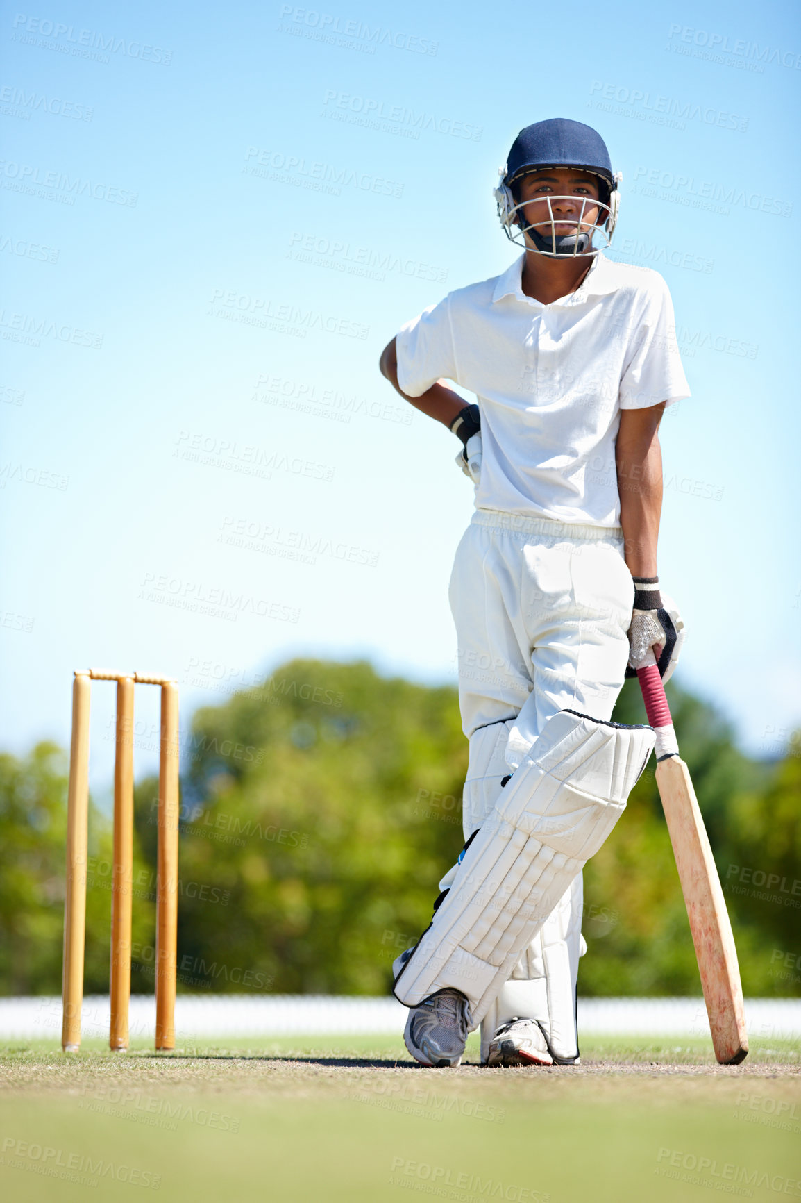 Buy stock photo Shot of a young cricket player outdoors