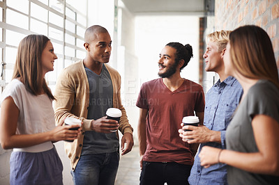 Buy stock photo College, friends and talking with coffee in a hallway for diversity, happiness and a drink. Group of men and women students at campus or university for a chat or conversation about education career