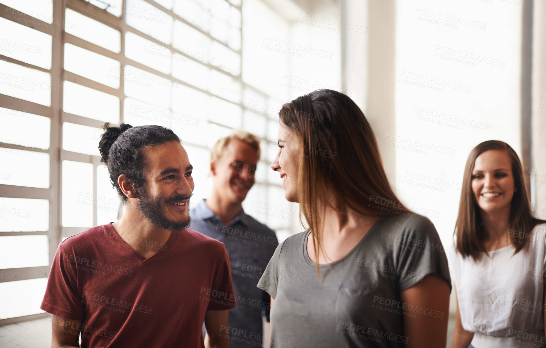 Buy stock photo College, friends and talking while walking together in hallway for discussion or chat. Group of diversity men and women students at campus or university for happy conversation about education career