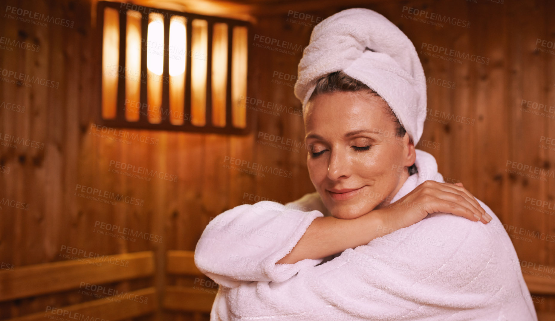 Buy stock photo Shot of a mature woman in a sauna