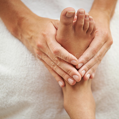 Buy stock photo Cropped shot of a woman's foot being massaged