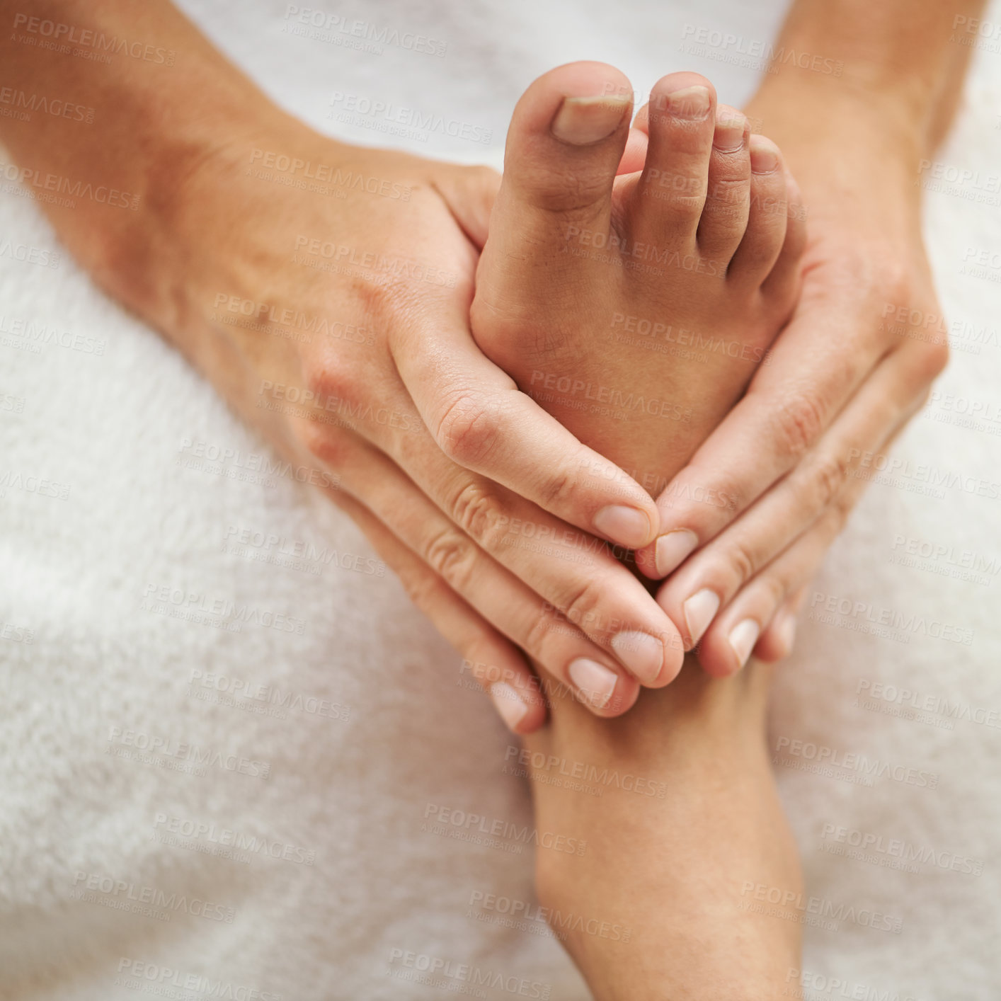 Buy stock photo Cropped shot of a woman's foot being massaged