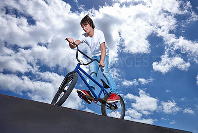 Buy stock photo Ride, ramp and man with bike at park, event or competition for sport with risk, energy and freedom. Mockup, space or person in performance of stunt trick on bicycle for fun in summer with adventure