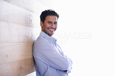 Buy stock photo Businessman, portrait and positive professional by wood background and confidence in consulting company. Entrepreneur, indian person and face in startup business and commitment or happy in career
