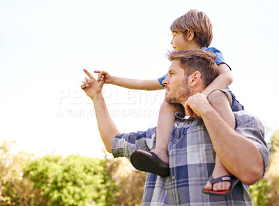 Buy stock photo Pointing, nature and child on father shoulders in outdoor park or field for playing together. Adventure, bonding and young dad carrying boy kid for fun and sightseeing in garden in Canada for summer.