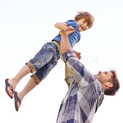 Buy stock photo Father, son and playing together in white background, happy child and dad in studio. Family time, parent and toddler are enjoying or smile or man, holding and lifting kid for fun and bonding