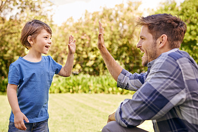 Buy stock photo High five, kid and man in park for family adventure, support and motivation with development. Dad, boy child and happy with excited hand gesture for success, teamwork and happiness together in garden