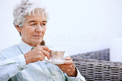 Buy stock photo Senior, woman and thinking with cup for retirement, relaxing on patio in peace enjoying wellness retreat and pension. Elderly person, plan activities and drinking tea with reflection and nostalgia 