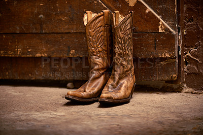 Buy stock photo Shot of a pair of cowboy boots