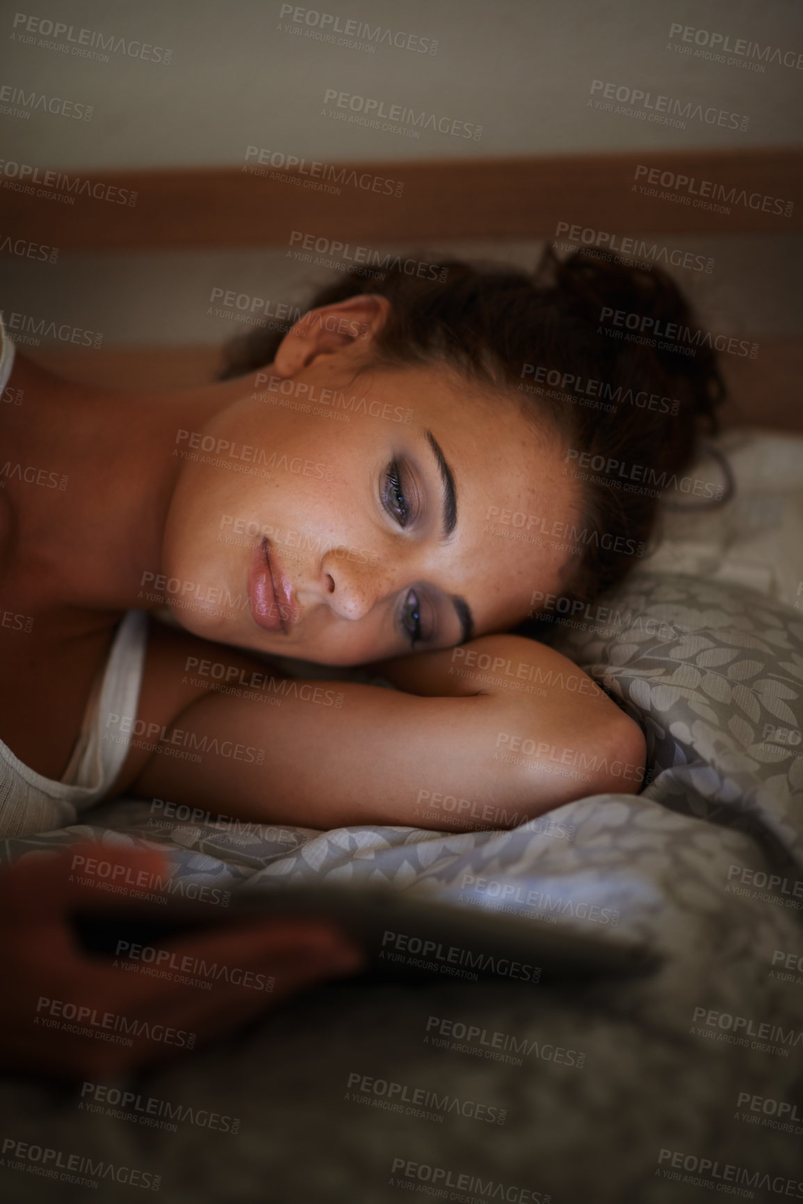 Buy stock photo Woman, tablet and bed at night, scrolling and entertainment with tech and relaxing for peace before sleep. Female person, browsing and online for home, internet and elearning or social media