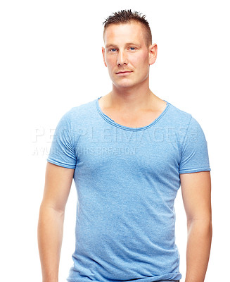 Buy stock photo Portrait, man and confidence for fashion, clothing and trendy style in contemporary looks on studio background with happiness, casual outfit and smile. Male person, model and face in blue t shirt