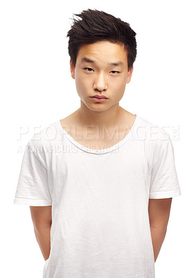 Buy stock photo Portrait, fashion and serious Asian man in studio for style or trendy shirt isolated on a white background. Face, confidence or young person, model or student in casual clothes on a backdrop in China