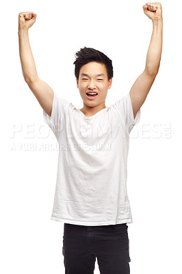 Buy stock photo Yes, winning and portrait with a Asian male teen with youth and achievement in studio. Winner, excited and teenager with white background and victory win with a smile and happiness feeling success