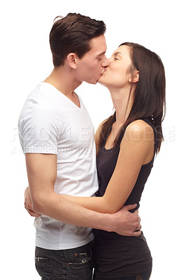 Buy stock photo Happy, kiss and couple with love, relationship and romance isolated against a white studio background. Partners, man and woman kissing, romantic and happiness with marriage, commitment and support