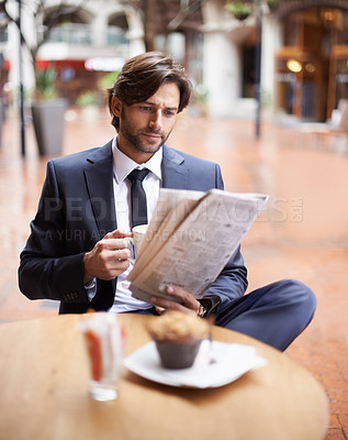 Buy stock photo Corporate, man and reading newspaper at cafe with coffee, muffin and outdoor for information and updates. Businessman, cup and restaurant to search for business, opportunity and economy trends