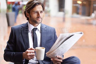 Buy stock photo Entrepreneur, man and thinking with newspaper at coffee shop outdoor, reflect and idea for company. Corporate, break and read information for opportunity, economy trends  for startup business.