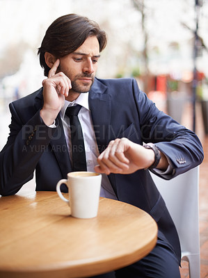 Buy stock photo Late, cafe and businessman thinking of time, workplace and appointment for meeting in office. Male person, schedule and coffee on table in shop, employee or staff or corporate company with watch