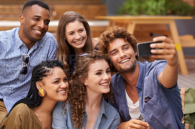 Buy stock photo Friends, happy and selfie on campus for memory with care and profile picture to update on social media. Students, diversity or cellphone for photography at university or bonding together in outdoor