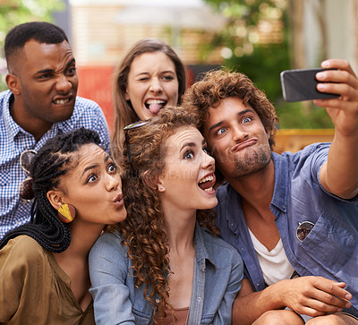 Buy stock photo Friends, happy and crazy selfie on campus for comedy, care and profile picture to update on social media. Students, diversity or mobile app for photography at university or memory together in outdoor
