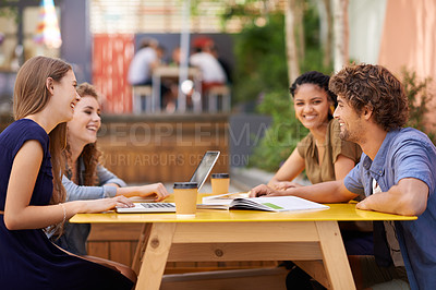 Buy stock photo A shot of university students studying on campus