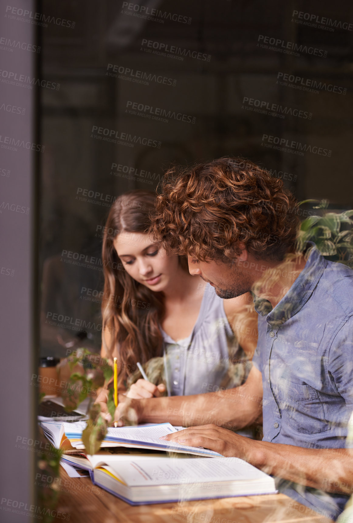 Buy stock photo Couple, reading and study in cafe, window and research with book and indoor at student centre. Man, woman and conversation for journalism, exam and test for thinking on date, people and communication