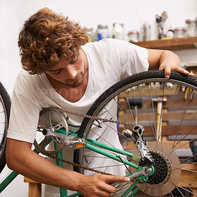 Buy stock photo Handyman, fixing and bicycles with with tools at workshop for repair, maintenance with small business. Mechanic, Entrepreneur and garage as expert for bike with equipment for service and upgrade