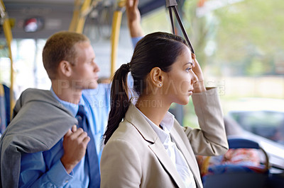 Buy stock photo Shot of young business people commuting to work