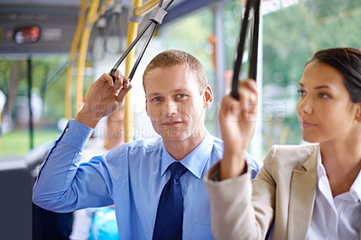 Buy stock photo Portrait, public transport and business man on bus for morning commute to work for start of career or job. Travel, work and young passenger riding metro with colleague in city for trip or transit