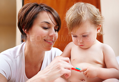 Buy stock photo Home, family and mother with baby, toys and happiness with love, bonding together and relaxing. Infant, mama and toddler with fun, playing and house with a break, learning and child development