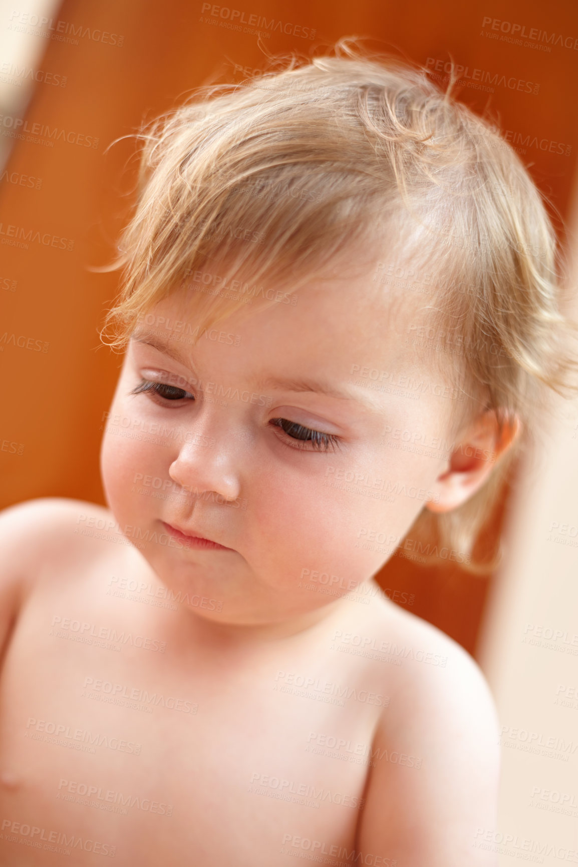 Buy stock photo Baby, face and child or infant in nursery with relax, healthy and development for growth or nurture in home. Kid, person and peaceful with waking up, carefree and calm expression in bedroom of house